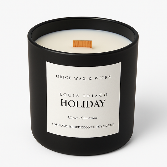 Black candle with a white label on a white background. LOUIS FRISCO HOLIDAY scented candle