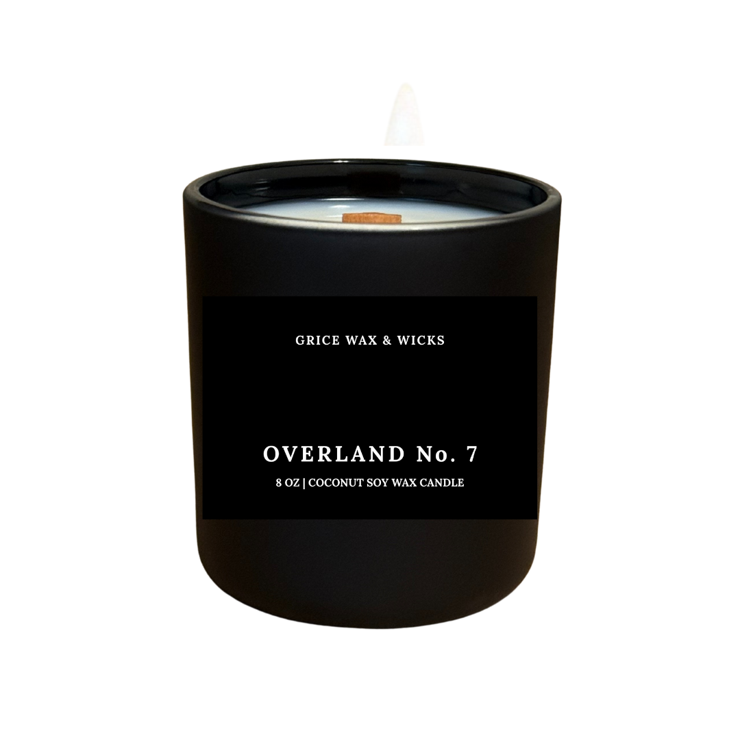 Black candle with 'Grice Wax & Wicks' branding on a white background