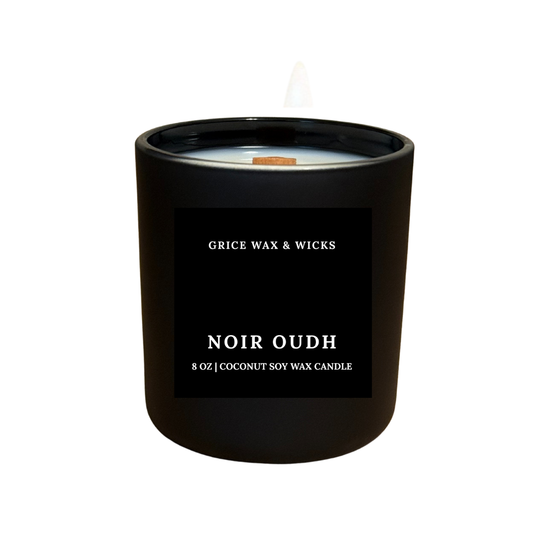 Black candle with 'Grice Wax & Wicks' branding on a white background