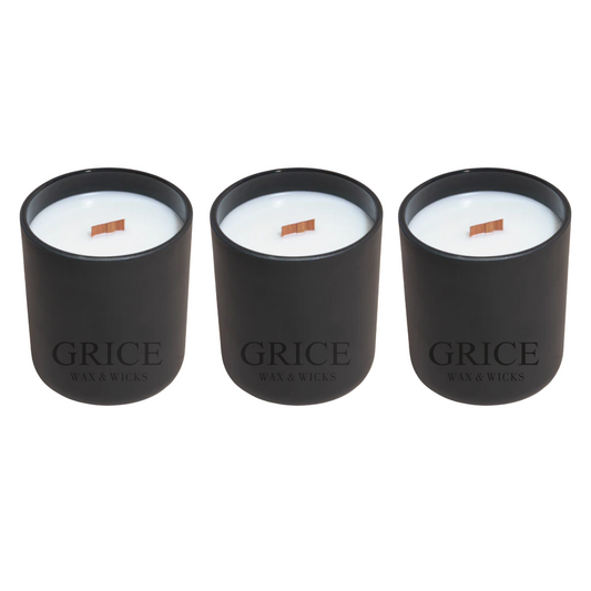 Three Luxury black matte candle jarS with coconut soy wax and wooden wick, featuring GRICE Wax & Wicks logo.