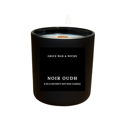 Black candle with 'Grice Wax & Wicks' branding on a white background