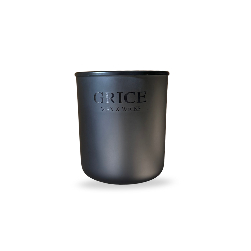 Black GRICE candle — Noir Oudh with amaretto, rich tonka bean, and oud for a clean luxury home fragrance.