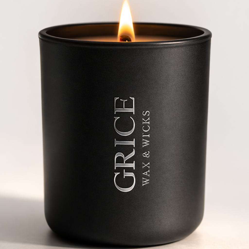 Black candle with 'Grice Wax & Wicks' branding on a white background