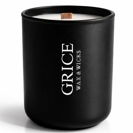 Black candle with 'Grice Wax & Wicks' branding on a white background