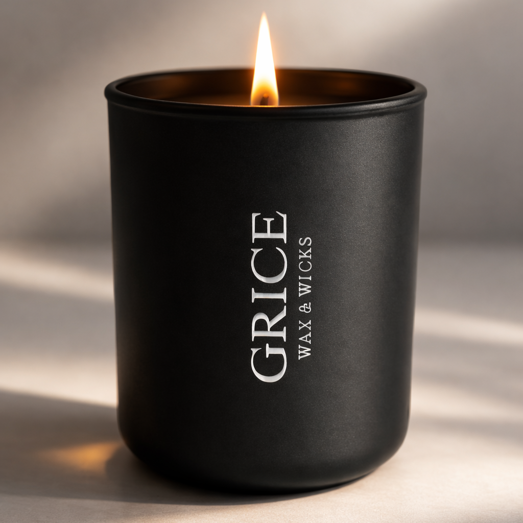 Black candle with 'Grice Wax & Wicks' branding on a neutral background