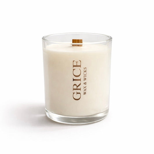 White candle in a glass jar with 'Grice Wax & Wicks' branding on a white background