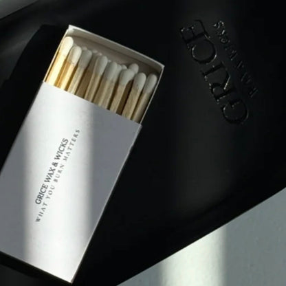 white match book on try by rice wax & wicks